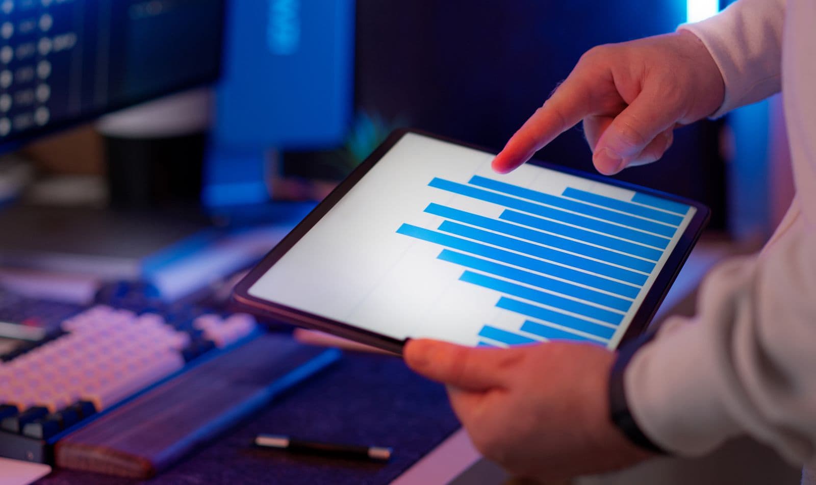 A pipeline analytics dashboard on a tablet, used to monitor sales development activity